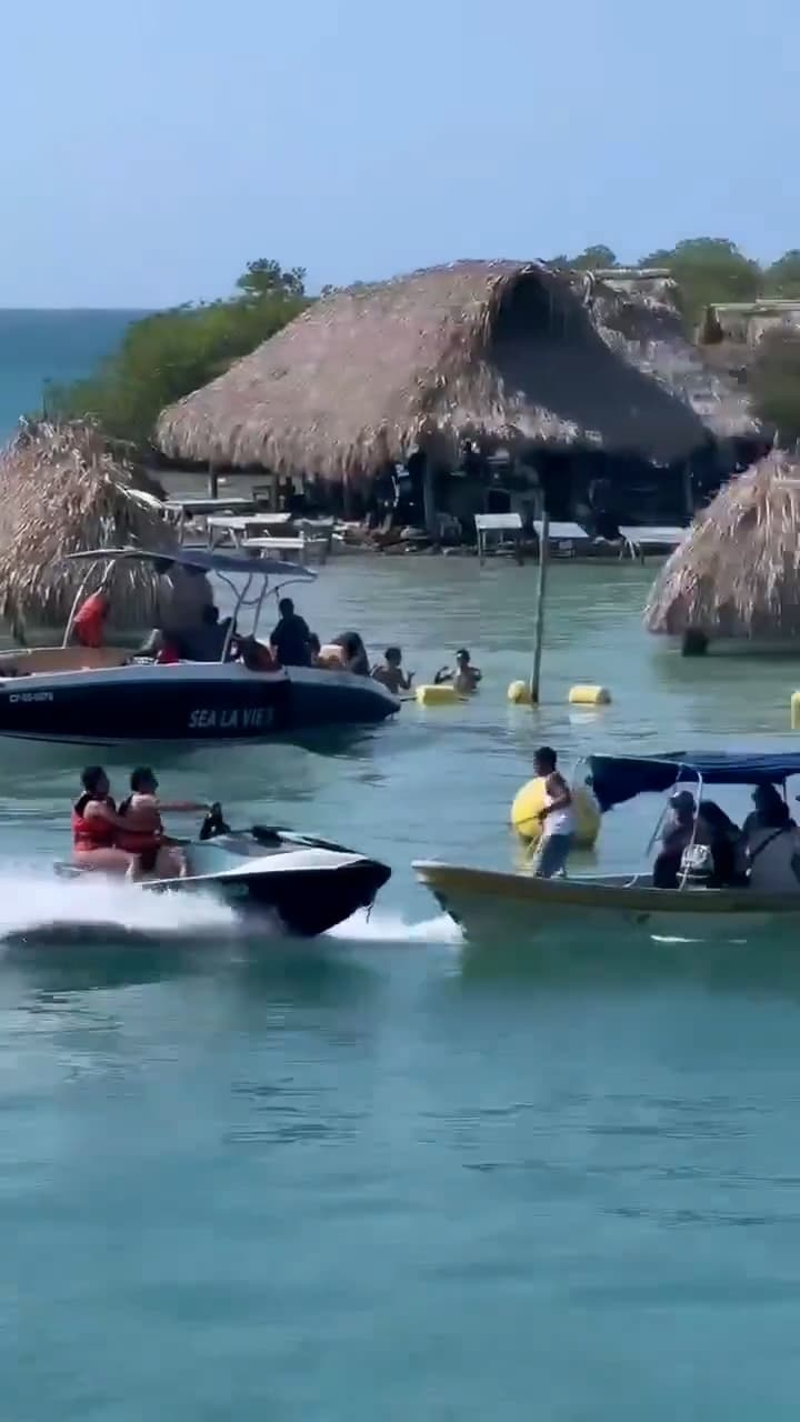 A jet ski collides with a passenger boat in Cholon, Colombia. It is unknown if anyone was injured. Note: Photo is a screenshot from a video. (Newsflash/NX)