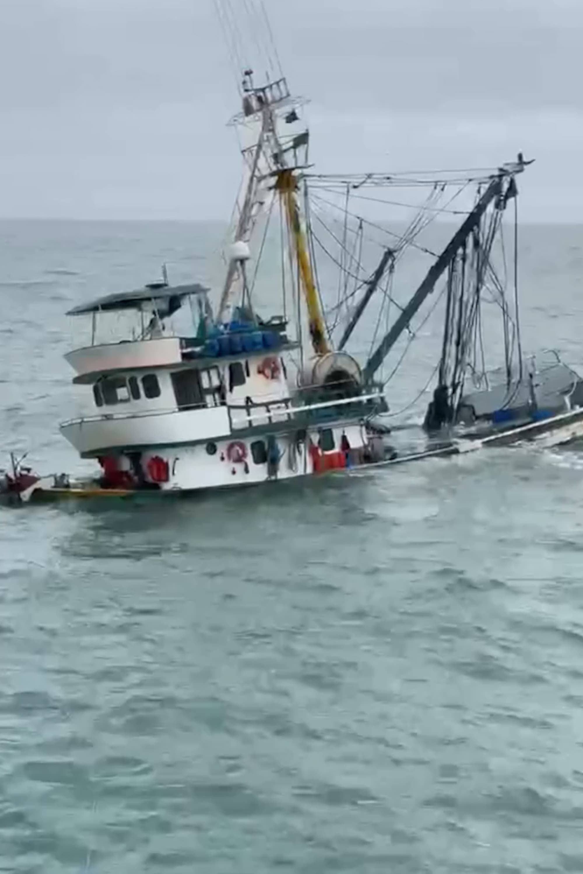 Fishing Boat Sinks Beneath Waves Off Brazil After Crew Rescued