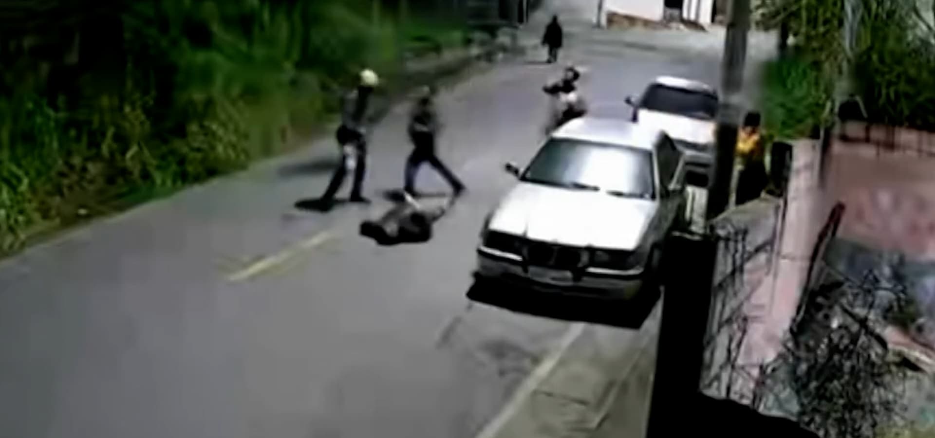 Ailton da Silva, 57, lays on the street after being punched by Antonio Edson de Oliveira Alves, 47, on Saturday, June 6, 2026, in Nova Lima, Brazil. He was killed trying to defend woman from a man harassing them. Note: Photo is a screenshot from a video. (Newsflash/NX)