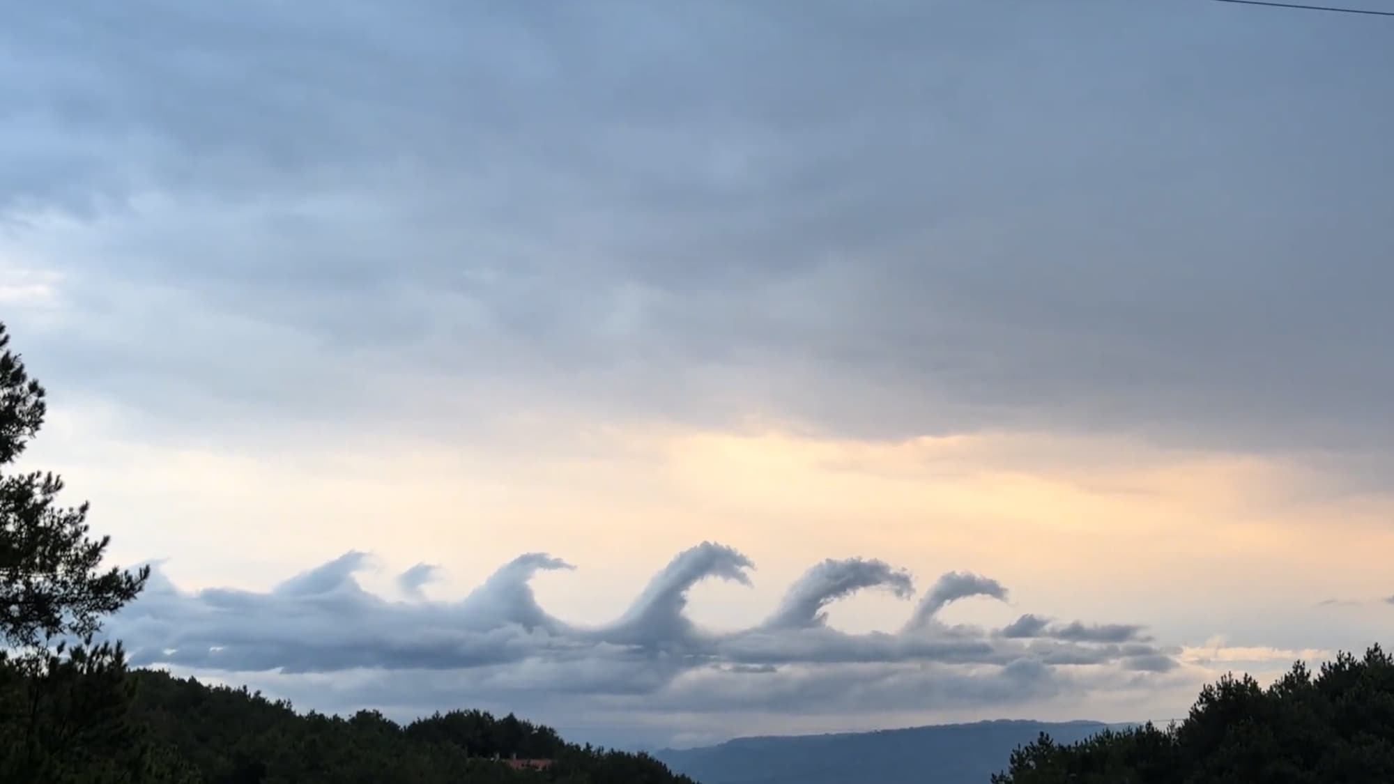 Dragon And Godzilla-Shaped Clouds Leave Onlookers Stunned Over Mountain