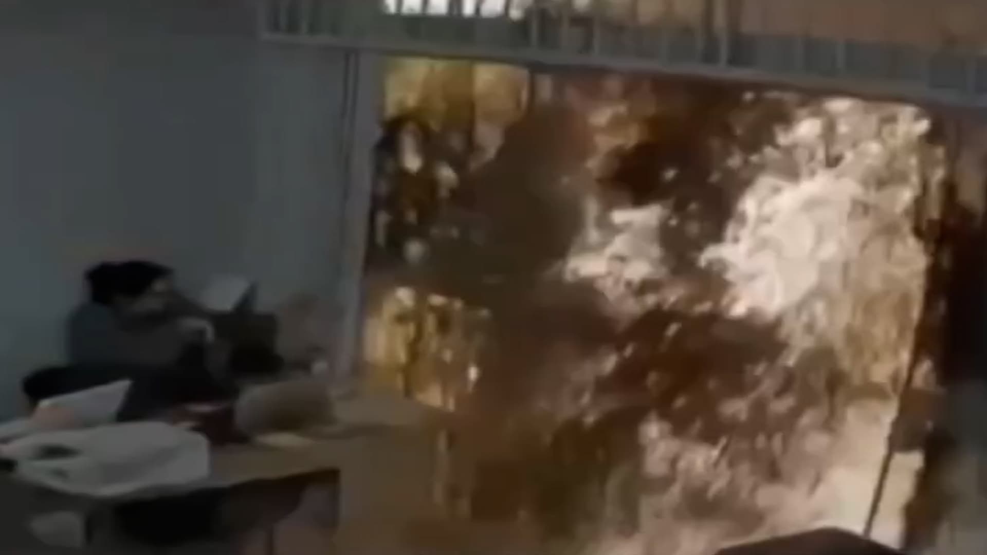 Burst Water Main Sends Wave Of Mud Through Shop And Floods It As Woman Flees