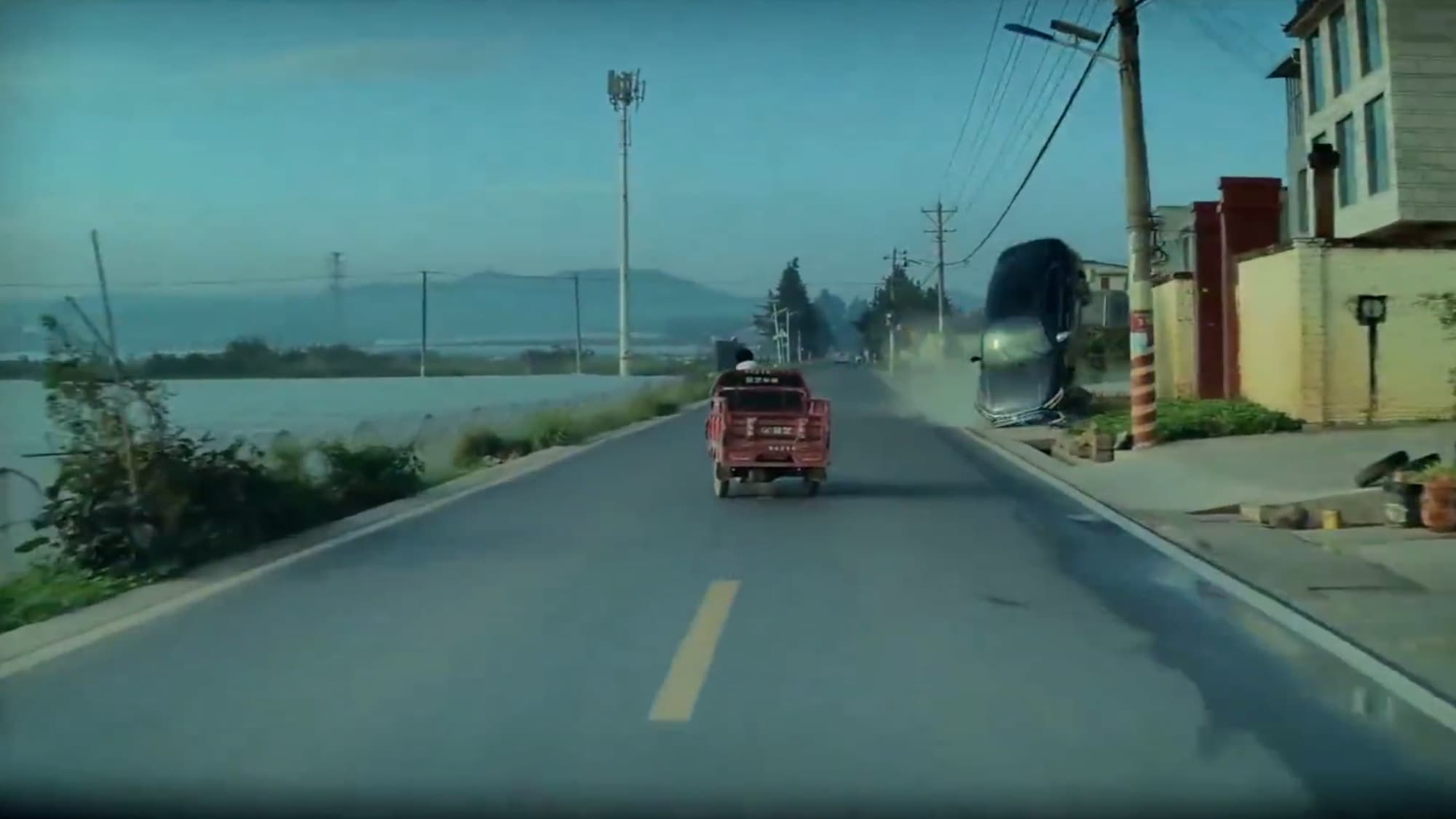 Car Shoots Into Air Before Landing Vertically On Roadside Wall