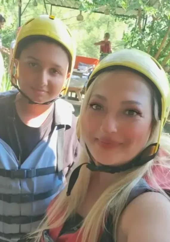 Cigdem Katalioglu poses with her son Taha Emir Kayaalp. He fell of the boat while rafting with his family and drowned after his leg became trapped by rocks. Note: Private picture. (Newsflash/NX)