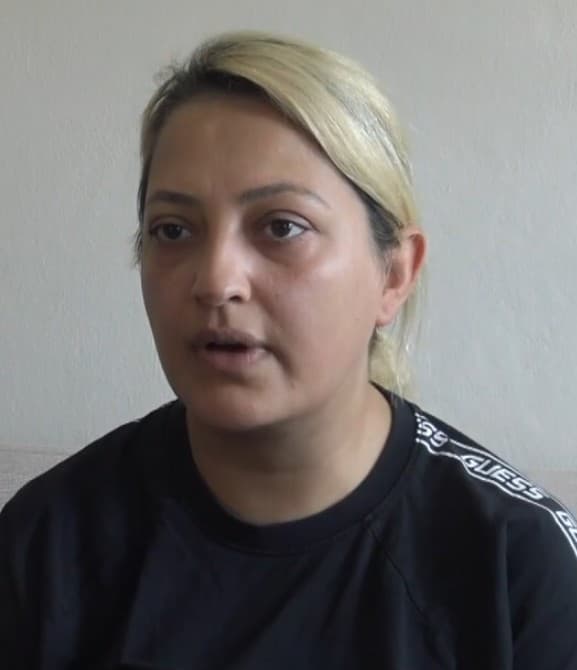Cigdem Katalioglu poses  in undated photo. Her son Taha Emir Kayaal fell of the boat while rafting with his family and drowned after his leg became trapped by rocks. Note: Picture is a screenshot from video. (Newsflash/NX)