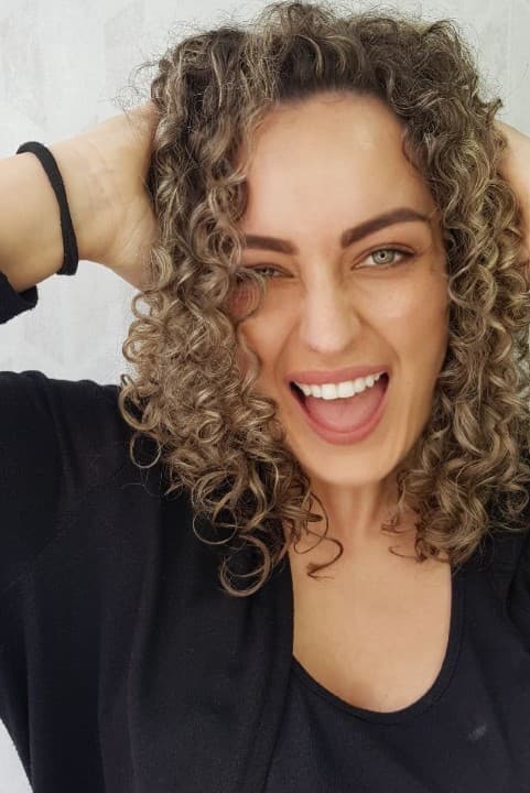 Edinara Goncalves Areze, 39, poses in undated photo. She was struck by lightning walking on the beach in Palhoca, Brazil. Note: Private picture. (Newsflash/NX)