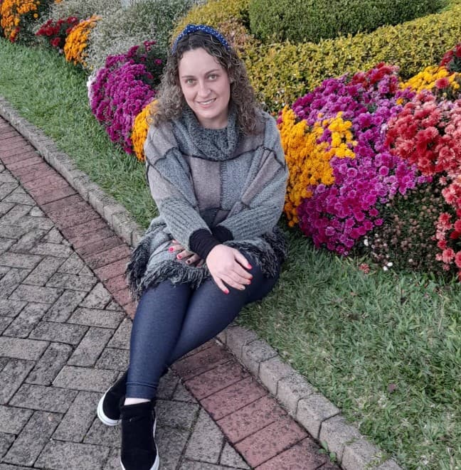 Edinara Goncalves Areze, 39, poses in undated photo. She was struck by lightning walking on the beach in Palhoca, Brazil. Note: Private picture. (Newsflash/NX)