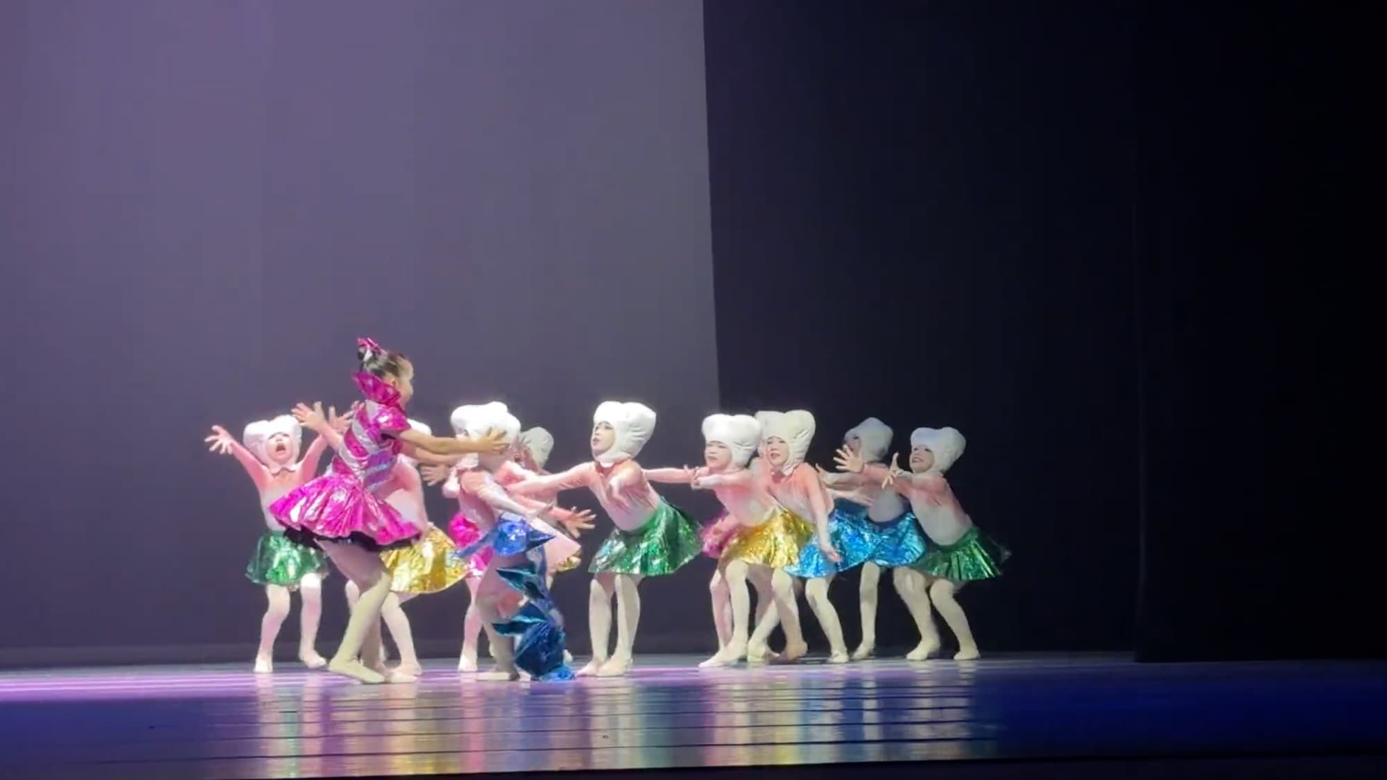 Eight-Year-Old Girl Praised After Turning Dance Costume Blunder Into Part Of The Act