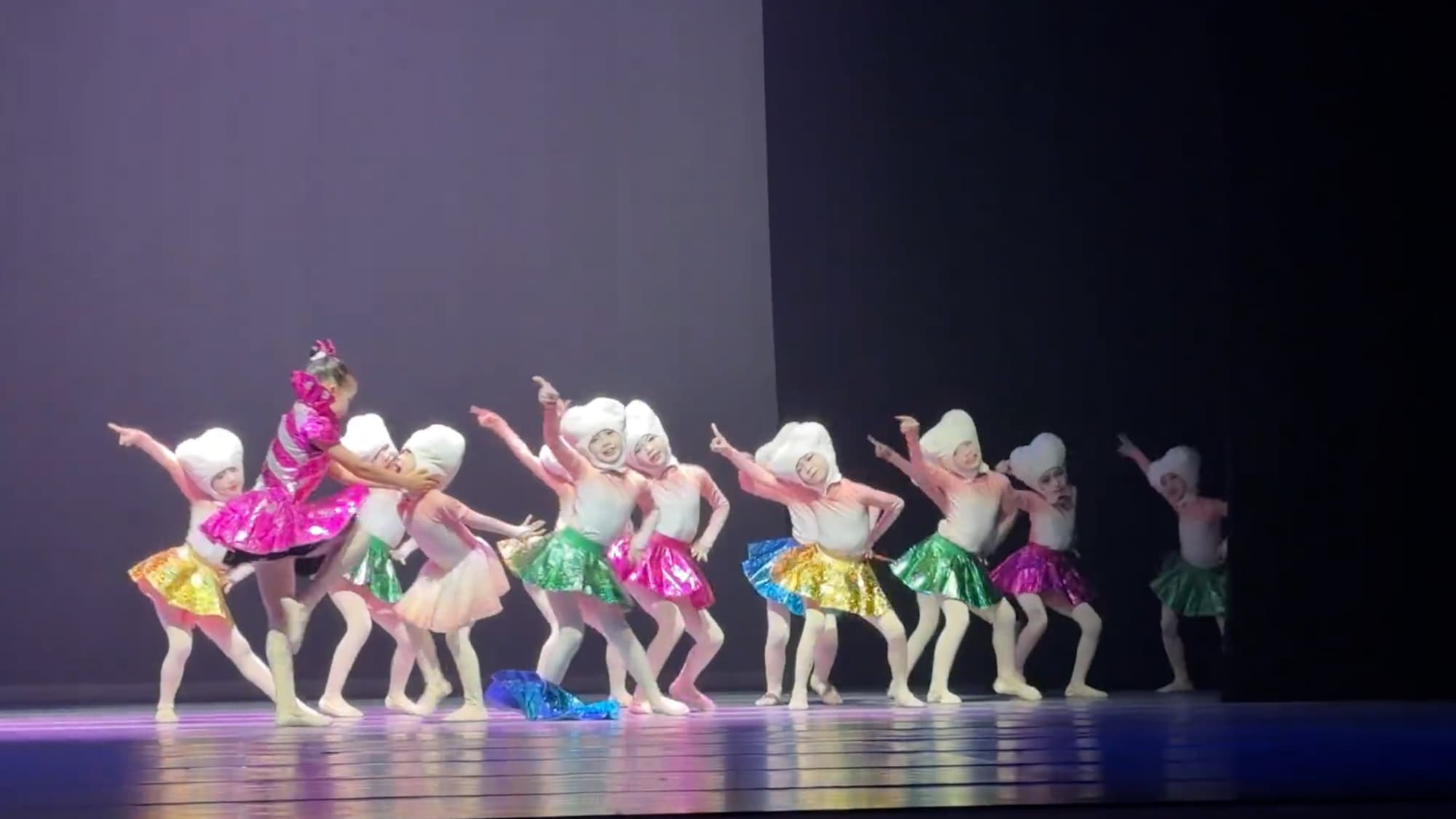 An eight-year-old girl saves the day when her teammate's skirt fell off during a dance competition in Shenzhen, Guangdong in China. The video was shared on Douyin - the Chinese version of TikTok on Aug. 28, 2026. Note: Photo is a screenshot from a video. (AsiaWire/NX)