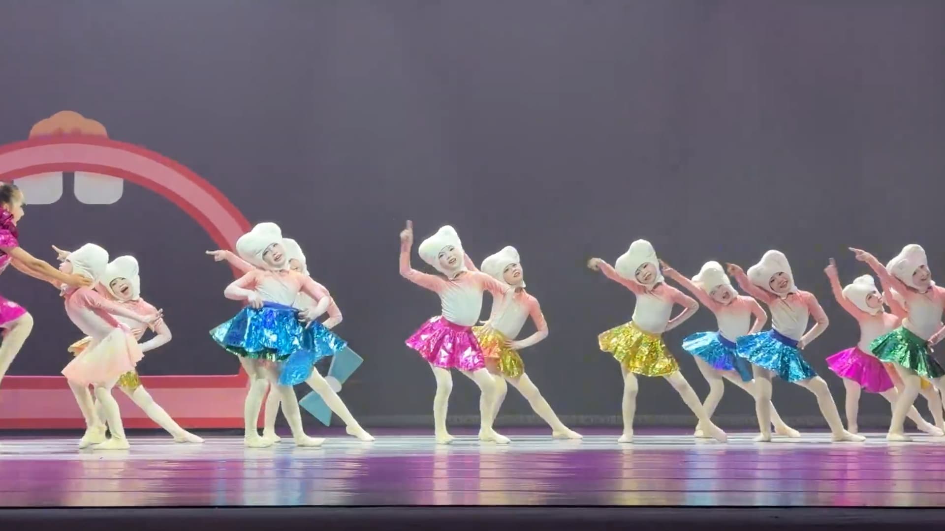 An eight-year-old girl saves the day when her teammate's skirt fell off during a dance competition in Shenzhen, Guangdong in China. The video was shared on Douyin - the Chinese version of TikTok on Aug. 28, 2026. Note: Photo is a screenshot from a video. (AsiaWire/NX)