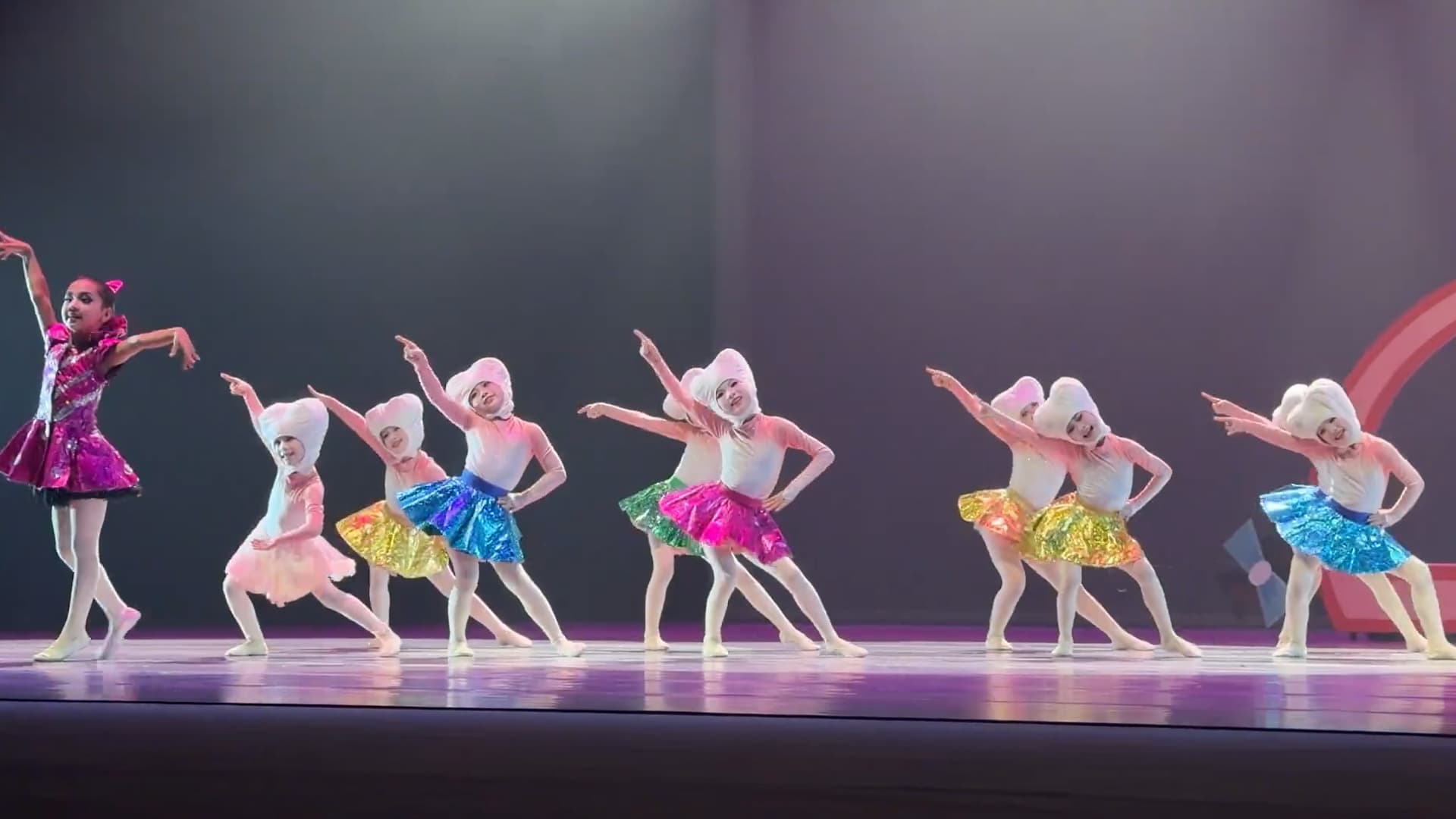 An eight-year-old girl saves the day when her teammate's skirt fell off during a dance competition in Shenzhen, Guangdong in China. The video was shared on Douyin - the Chinese version of TikTok on Aug. 28, 2026. Note: Photo is a screenshot from a video. (AsiaWire/NX)