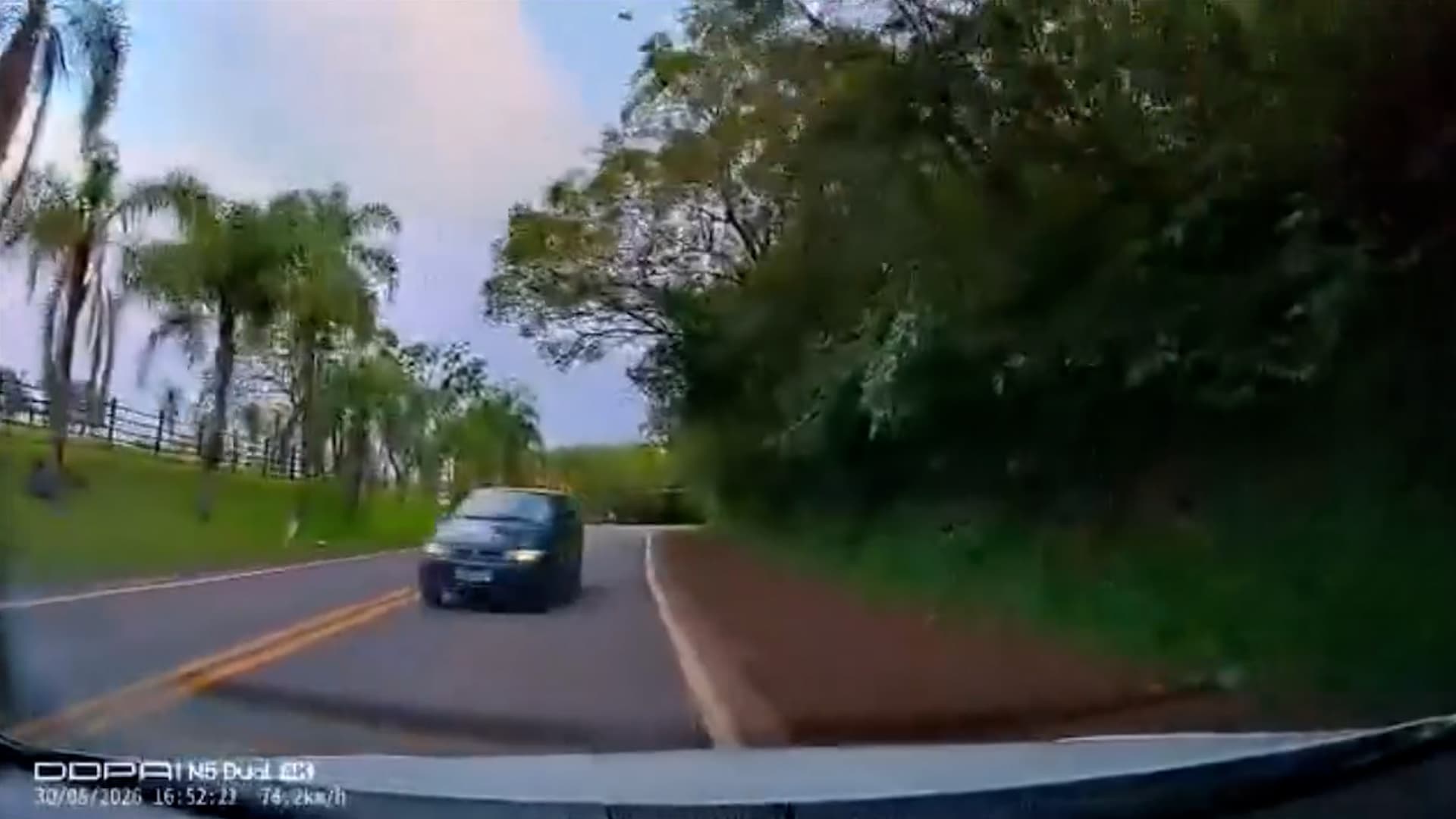 A car swerves into the oncoming lane before it hits a car head-on in Boa Vista do Burica, Brazil. A 48-year-old driver died and two other people were injured. Note: Photo is a screenshot from a video. (Newsflash/NX)
