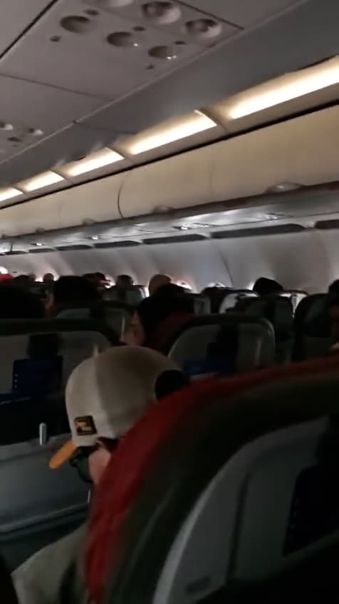 Picture shows passengers on a plane that veered off the runway during landing at Cascavel Regional Airport, Brazil. The plane was carrying 145 passengers and six crew members. Note: Photo is a screenshot from a video. (Newsflash/NX)