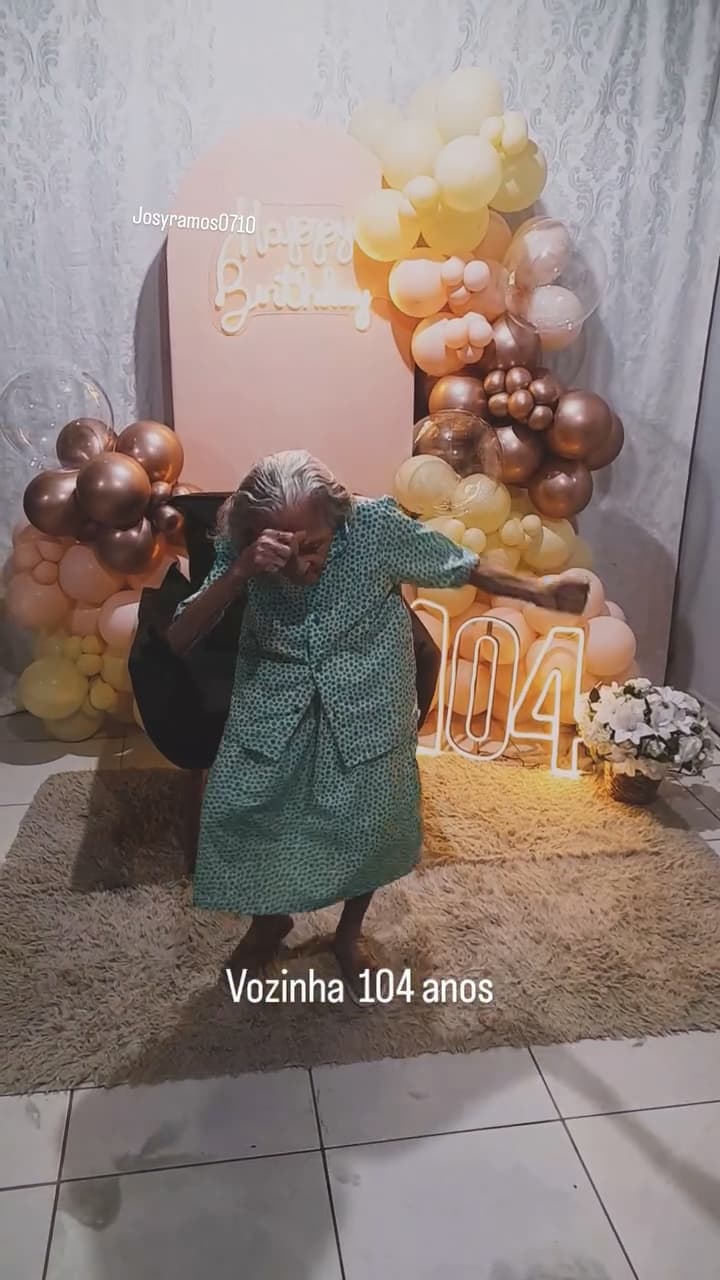 Maria Lurdes da Silva dancing during her 104th birthday celebration. A video posted of the celebration became viral in Brazil. Note: Photo is a screenshot from a video. (@josyramos0710, Newsflash/NX)