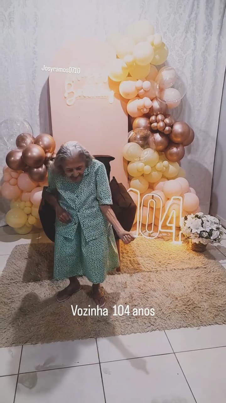 Maria Lurdes da Silva dancing during her 104th birthday celebration. A video posted of the celebration became viral in Brazil. Note: Photo is a screenshot from a video. (@josyramos0710, Newsflash/NX)