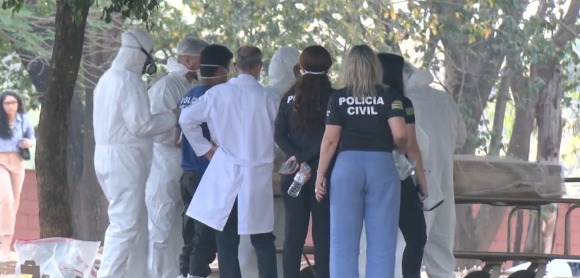 Police exhume the body of Andreia Vieira Gaspar, 51. She died after undergoing plastic surgery in Goiania, Brazil. Note: Picture is a screenshot from video. (Newsflash/NX)