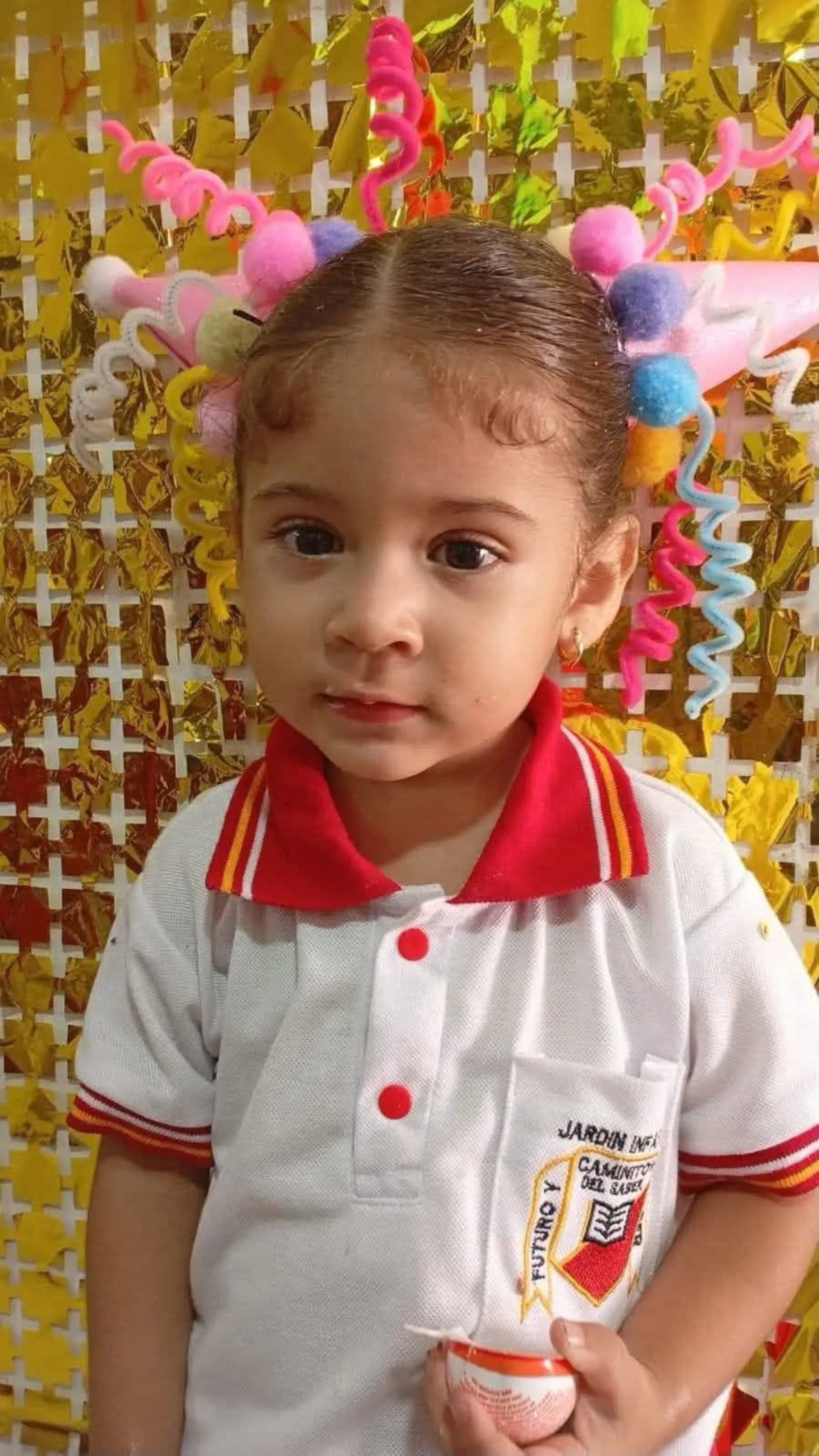 Celeste Valentina Osorio Duque, 2, poses in undated photo. She was shot and killed in Polonuevo, Colombia. Note: Private photo. (Newsflash/NX)