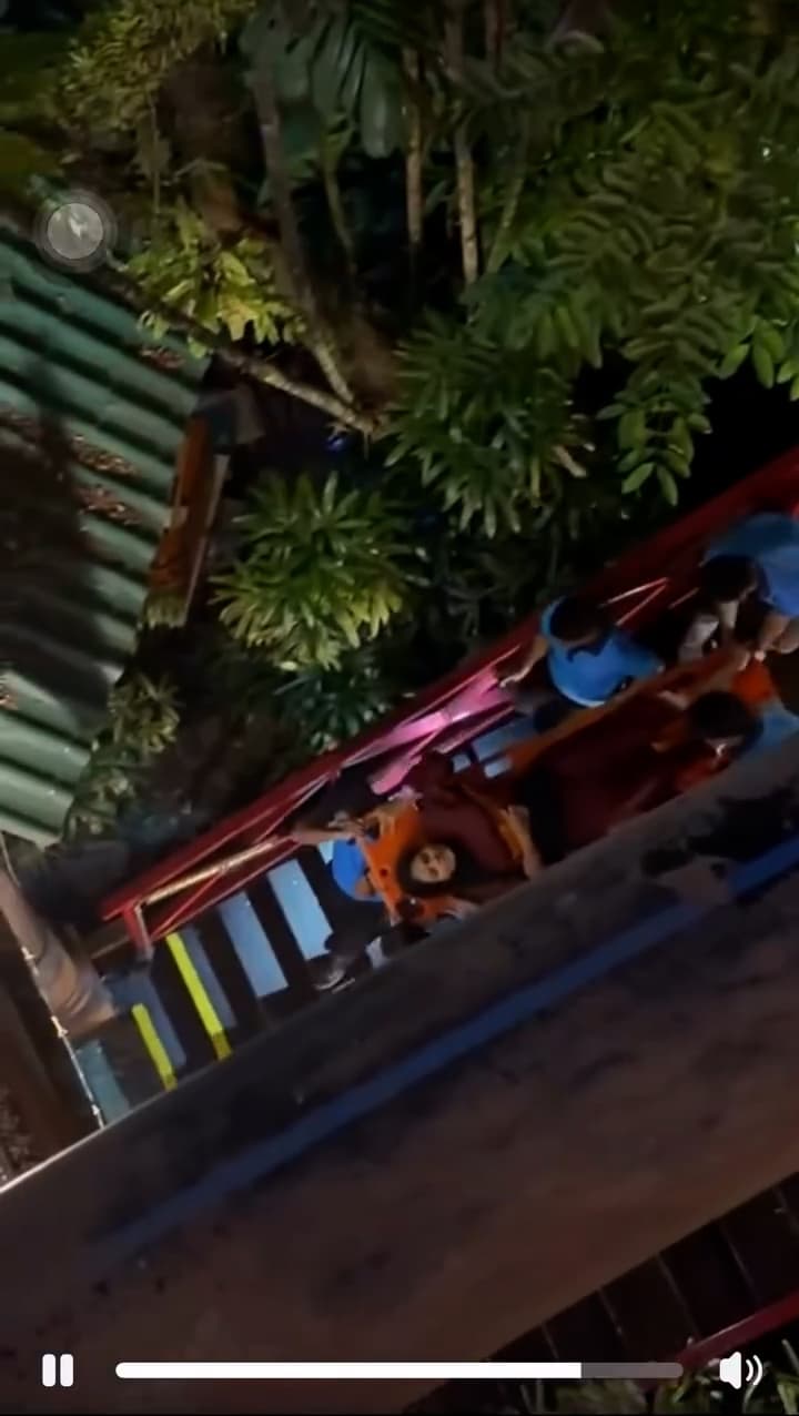 Workers help injured woman after accident at a theme park roller coaster on Saturday, August 22, 2026, in Subang Jaya, Malaysia. Ten people were injured. Note: Photo is a screenshot from a video. (Newsflash/NX)