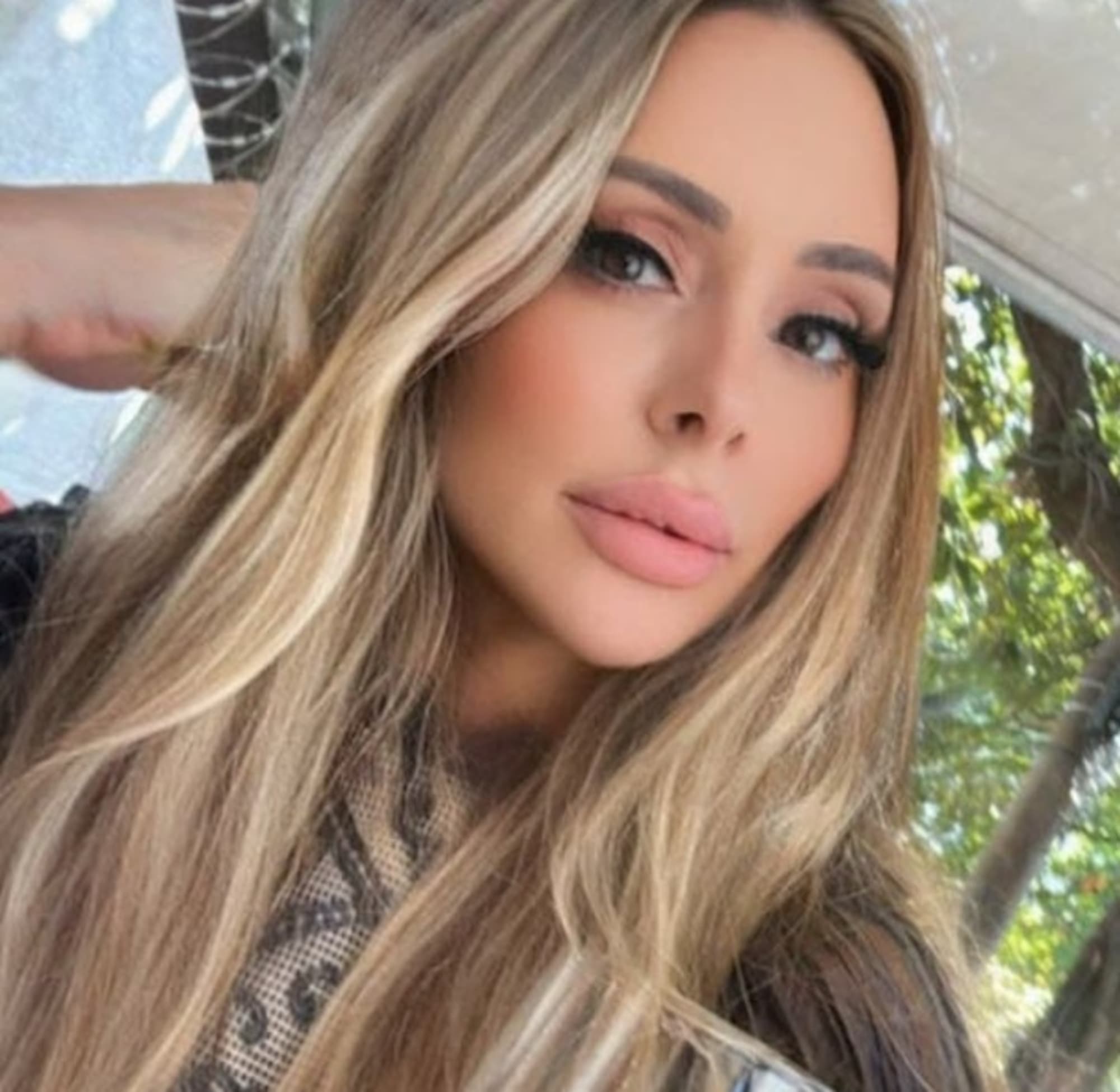 Andreia Vieira Gaspar, 51, poses in undated photo. She died after undergoing plastic surgery in Goiania, Brazil. Note: Private picture. (Newsflash/NX)